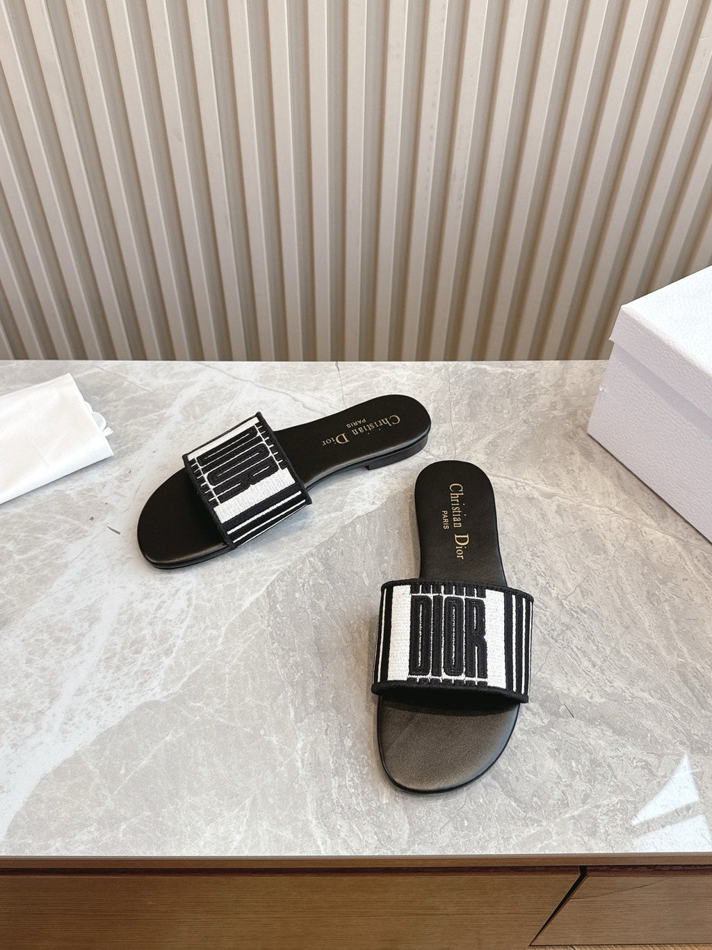 DIOR FLAT SLIDES 25S IN BLACK CALFSKIN AND FABRIC BRAND NAME EMBROIDERY